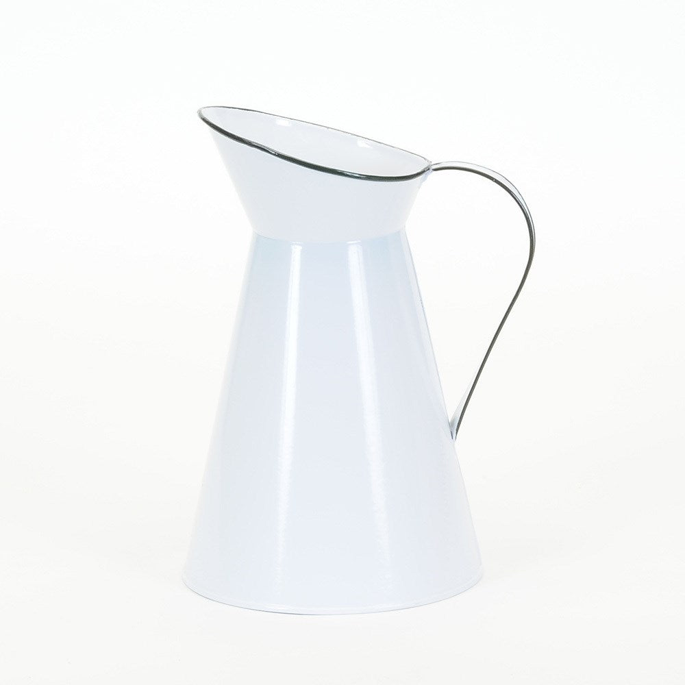 White metal pitcher with black rim